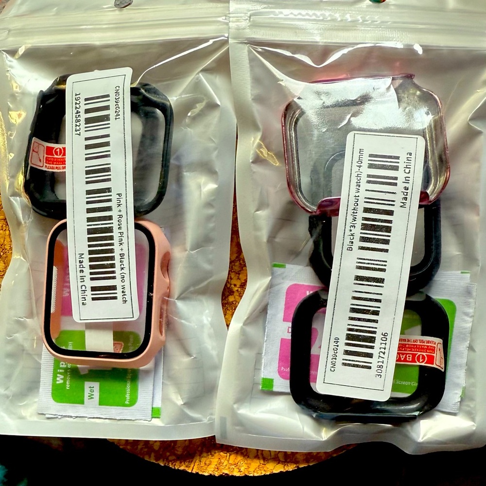Set of Pink and Black Watch Cases